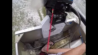 Boat wake on raised transom with 15hp Merc Sea Pro deep shaft on 12 aluminum boat