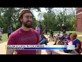 Students residents gather to watch partial eclipse at Coca-Cola Space Science Center