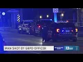 Man shot injured by Grand Rapids police officer