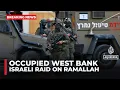 Download Lagu Israeli forces raid Ramallah in the West Bank, firing tear gas and live ammunition