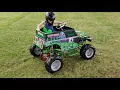 Muddy fun in out 24v Grave Digger power wheels