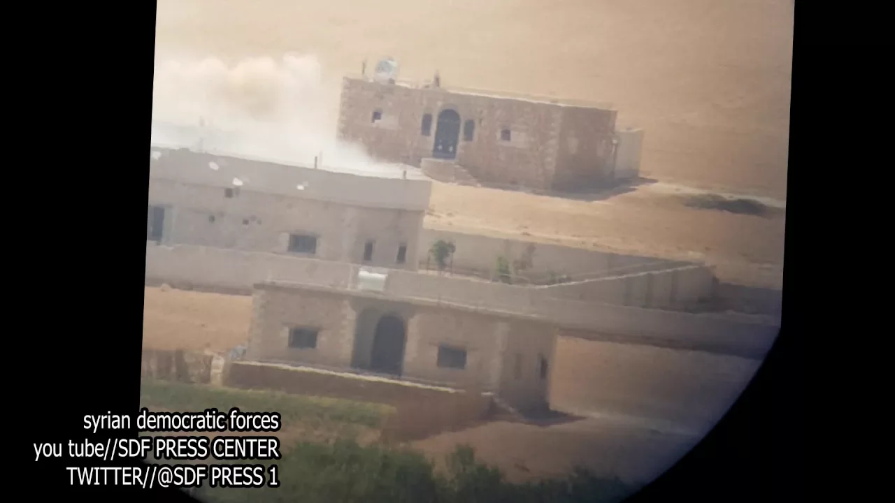 a moment while ISIS terrorists are running a way during the clashes with Syrian Democratic Forces