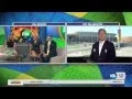 NBC s Jay Gray helps Andrew Wittenberg get in the Olympic spirit