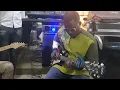 Jeremiah Gyang Playing "Na ba Ka " on guitar.