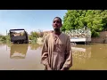 Download Lagu Sudanese navigate waist-deep water after flooding near Khartoum | REUTERS
