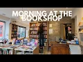 Morning at the bookshop books delivery making coffee for the customers