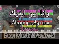 Nancy Ajram - Wana Bein Eidik - Akbar Men Keda ( Karaoke + Lirik )