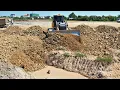 Wonderful ￼SHANTUI DH17 C3 Bulldozer Pushing Soil Fill Deep pit with Heavy Dump truck pouring 