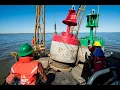 U S Coast Guard sets buoys on Saginaw Bay