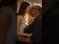 Young woman and old black lesbian woman kissing
