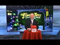 Mike Marshall opens a special SPAM ornament for Jude s Jingle Tree