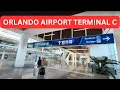 Orlando Airport MCO Terminal C - Walking Tour Car Rental Garage Train to Terminal A and B