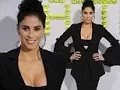She left her shirt at home Sarah Silverman 46 flashes her bra under suit as she shines at Battle