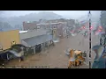 King Street in Boone flooded cars moving through floodwaters