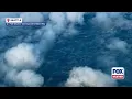 Exclusive footage shows aerial views of the flooded suburbs of Seattle then the snow-covered views