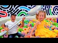 Nastya and dad have fun in the playgrounds and the amusement park for kids
