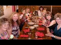 Crossdressers enjoying a dinner and cocktail party with supportive friends who also cross-dressing