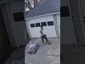 Surveillance footage shows homicide suspect Marckus Plaza jumping a backyard fence
