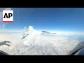 Download Lagu Video shows Russian jet flying within feet of US F-16 near Alaska