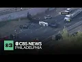 Car carrier truck overturns blocks I-95 northbound near Commodore Barry Bridge