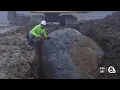 Crew unearths prehistoric glacial boulder
