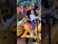 Dr Seuss carousel with Evan and mom