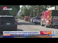 Police standoff with barricaded suspect in Northridge