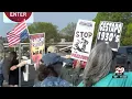 Protesters line Route 29 ahead of President Trump s Charlottesville visit