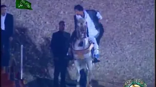 الشهيد البطل معمر القذافي يعتلي ظهر حصانه 