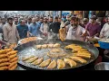 Download Lagu GUJRANWALA FRIED FISH PAKORA RECIPE | BIGGEST SEAFOOD STREET TAWA FRY FISH PAKODA | FISH FRY PAKORA