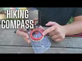 Emergency compass including a survival lanyard with more tools