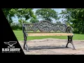 Aged Black Cast Iron Dog Park Bench