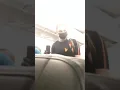 man with a burger king hat gets annoyed on a plane