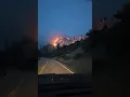 Wildfire burning along Hwy 55 north of Banks