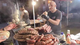 Italian Big Grill Beef Sausages and Big Caciocavallo Hanging Cheeses. Street Food
