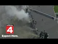 Aerial footage shows smoke billowing from apartment building Farmington Hills
