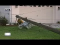Power lines down across home s driveway in Lehigh Acres