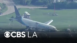 5 dead after Amazon cargo jet rolls off Miami International Airport runway