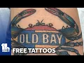 People line up down the block for free Old Bay tattoos in celebration of Preakness Week
