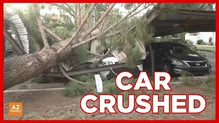 Glendale resident reacts after storm smashes his car