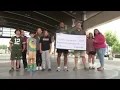 AJ Dillon donates to Families of Children with Cancer Foundation