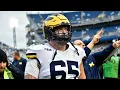 Michigan star OL Zinter carted off with leg injury