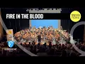 Lagu Fire in the blood (Paul Lovatt-Cooper, arr. Luc Vertommen)