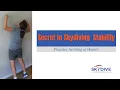 Practice arching while standing up