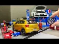 Volkswagen Golf And Polo Diecast Model Cars Are Being Repaired And Serviced