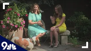Meteorologist Danielle Grant brings a four-legged friend into the 9NEWS backyard