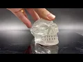 Clear quartz traveler skull with rainbow