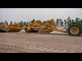 John Deere Scraper Comparison - Carry-all vs Ejector Style