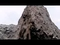 Download Lagu Sliding down a cliff full of large rocks and lots of sand material..
