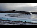 View of People Skating the Woodstock NB Ice Oval